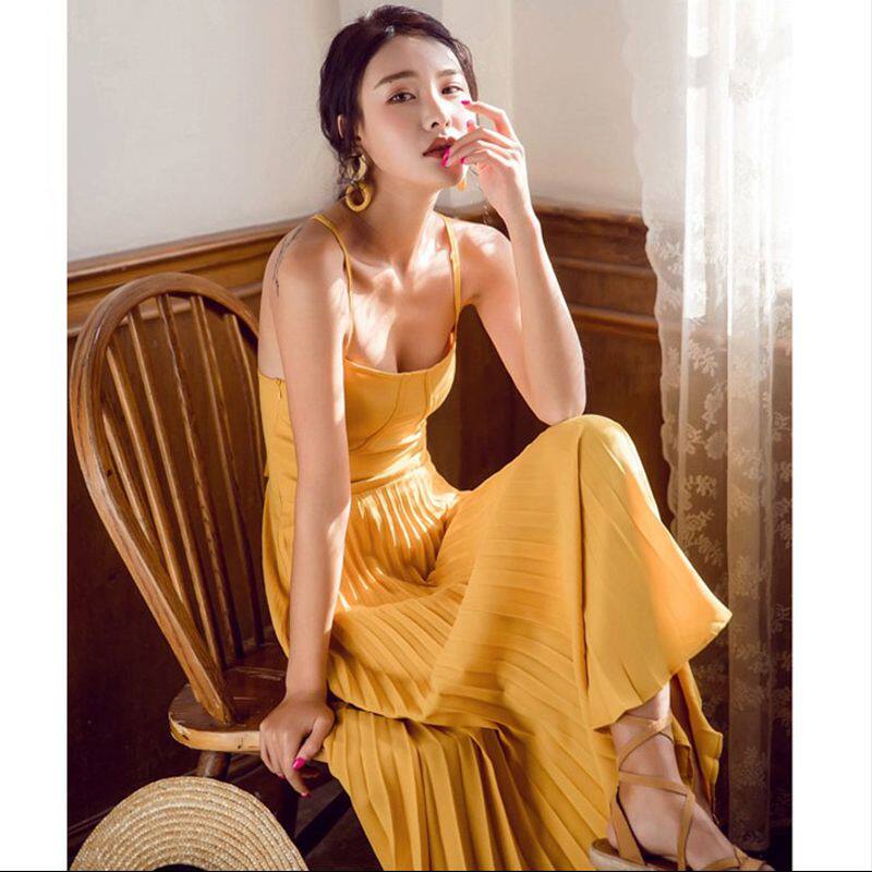 Beach skirt women's summer 2021 new Thailand seaside vacation careful machine halter long dress suspender thin dress fairy