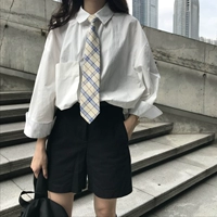 2018 đầu thu mới áo sơ mi nữ sang trọng phiên bản Hàn Quốc của túi lớn retro rắn màu áo dài tay sinh viên + cà vạt nhỏ áo sơ mi trắng nữ công sở