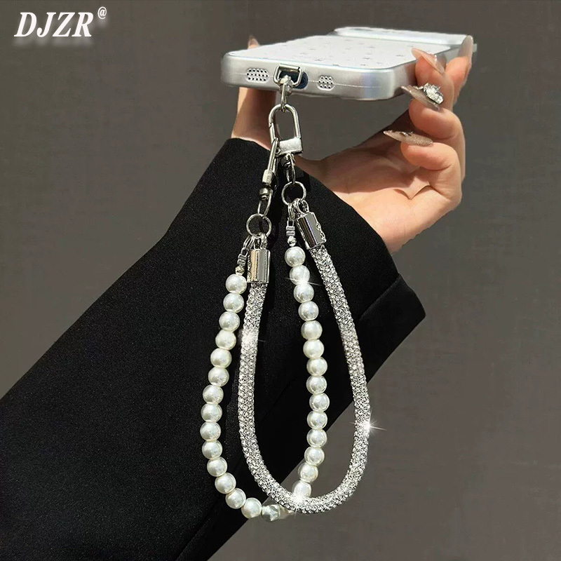 Double-Layered Phone Chain with Sparkling Rhinestones and Pearls, Beaded Chain with Double Clasp, Short Wrist Accessory, Delicate Wristband Bracelet Double-Layered Phone Chain with Sparkling Rhinestones and Pearls, Beaded Chain with Double Clasp, Short Wrist Accessory, Delicate Wristband Bracelet