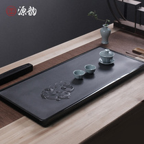 Genyun hand-carved natural Wujin Stone tea tray Stone tea table drainage household stone simple black gold stone Tea Sea