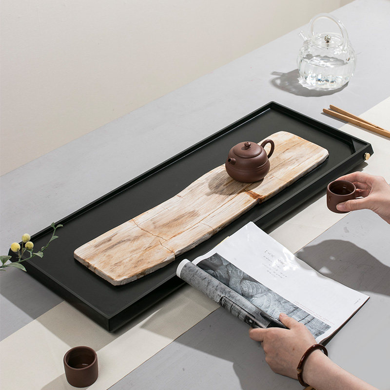 Natural wood fossil tea tray creative simple new Chinese tea table household small tea tray black stone tea sea dry tea tray