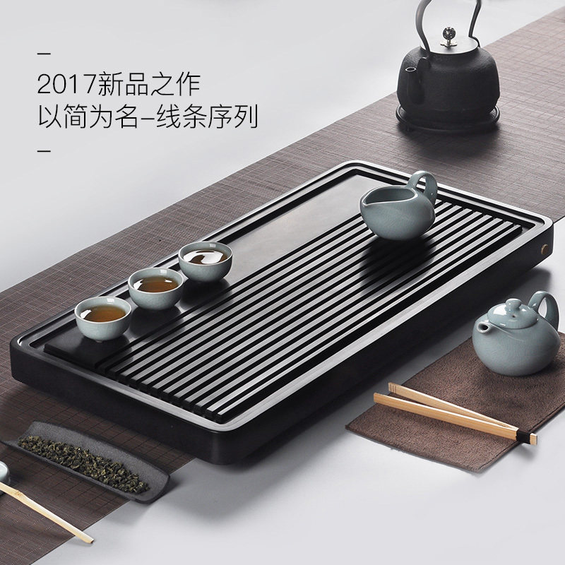 Yuan Yun natural whole thickened black gold stone tea tray Drainage dry bubble stone tea Sea tea table Kung Fu tea set