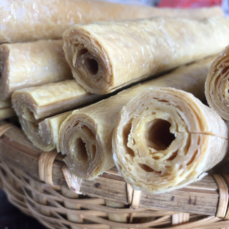 安徽六安豆腐棍：一口嚼出山野老味的豆皮干货传奇