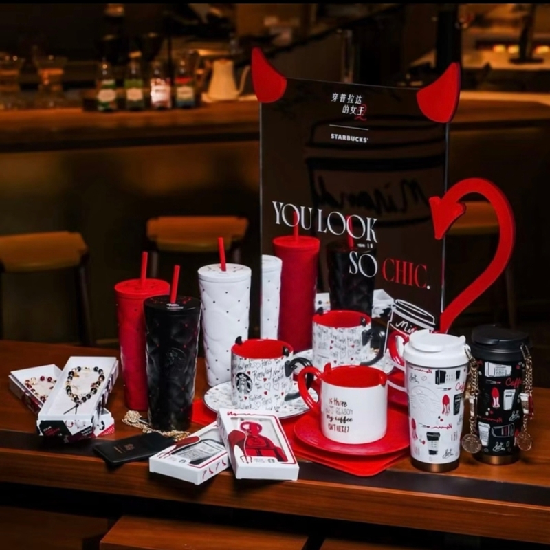 Starbucks X Prada Queen Collaboration Series: Phone Chain, Card Holder, Stainless Steel Travel Mug, and Mug Starbucks X Prada Queen Collaboration Series: Phone Chain, Card Holder, Stainless Steel Travel Mug, and Mug