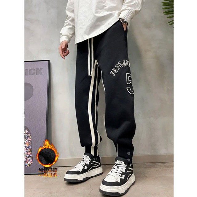 ຜູ້ຊາຍລະດູຫນາວໃຫມ່ velvet thickened sweatpants micro-elastic ຂາບາດເຈັບແລະ embroidered striped sweatpants ສີແຂງ harem pants