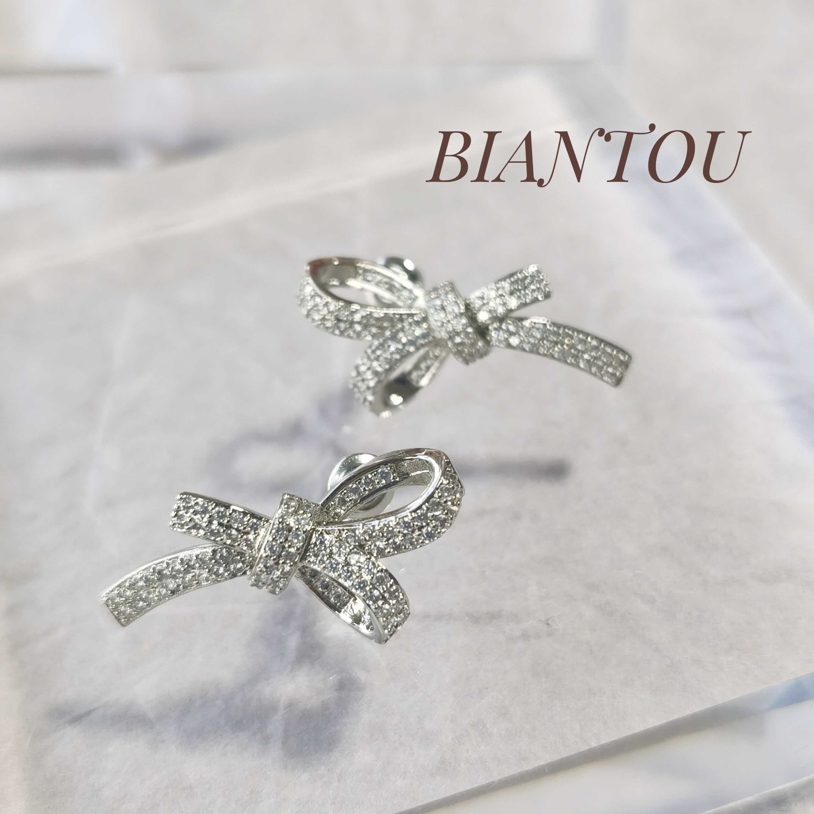 Biantou Half price overvalued Korean sweet and small fragrant wind inlaid with a simple butterfly knot ear nail S925 silver needle earrings