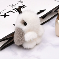 Бело-серые норковые волосы длиной 8 см.