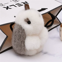 Бело-серые норковые волосы длиной 11 см.