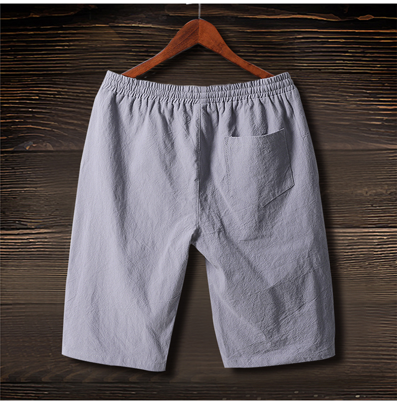 Thể thao mùa hè 5 năm quần nam cotton và linen shorts quần âu quần bãi biển mùa hè quần lớn phần mỏng thủy triều