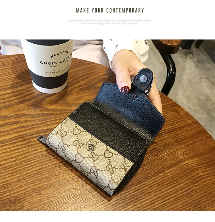 Ví da nữ ngắn gọn gấp thẻ gói nhỏ gọn một trong retro retro châu Âu và Hoa Kỳ 2019 mới thời trang đơn giản - Ví tiền ví da bò