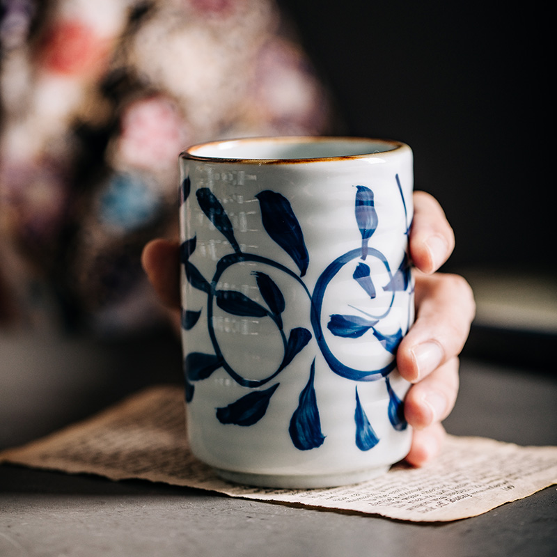 Japanese household water glass ceramic keller with a cup of creativity under the horizontal stripes antiskid hand - made glaze color tea cup