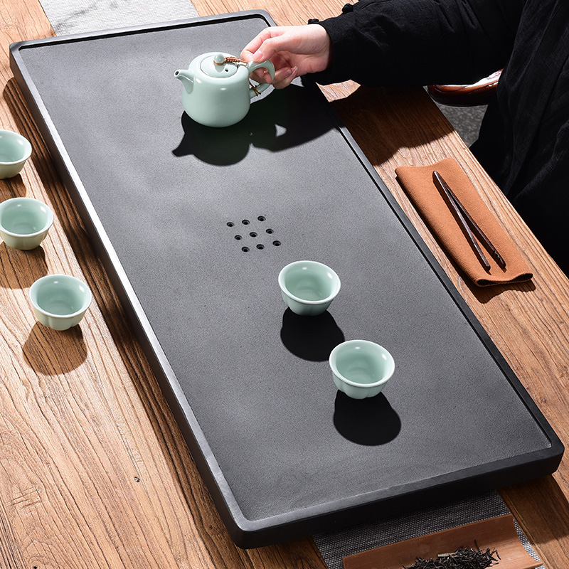 Tao blessing sharply stone tea tray was home drainage contracted sitting room the whole piece of black gold stone tea tray tea table can be customized