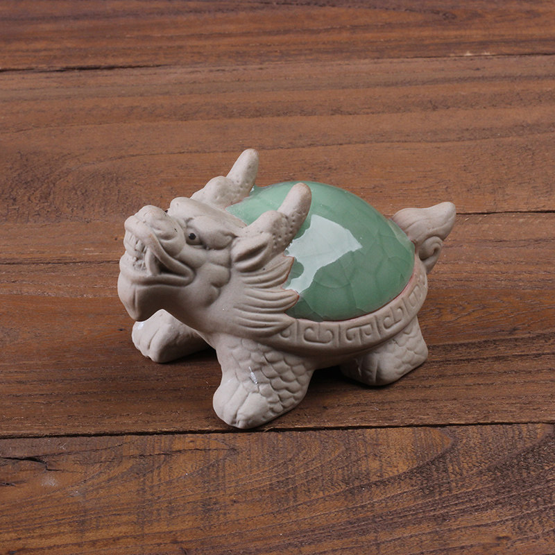 Goku dragon tortoise tea pet fengshui town Ping an open creative purple sand living room tea few tea play tea ceremony