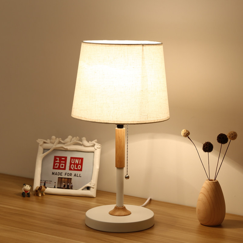 European bedroom bedside table lamp Japanese simple modern Nordic living room creative eye protection energy saving solid wood fabric table lamp