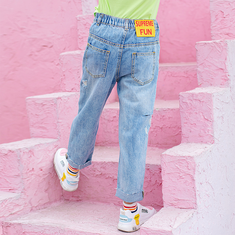 Girlpants 2019 mùa thu ăn mặc mới của Hàn Quốc phiên bản Big Thời trang trẻ em Breaking Lỗ Straight Loose Casual Pants Denim triều.