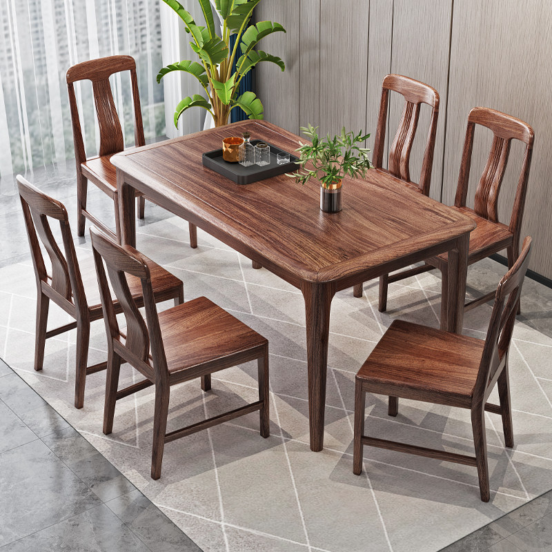 Modern minimalist ebony wood solid wood dining table and chair combination new Chinese style 1 4m small apartment rectangular dining table