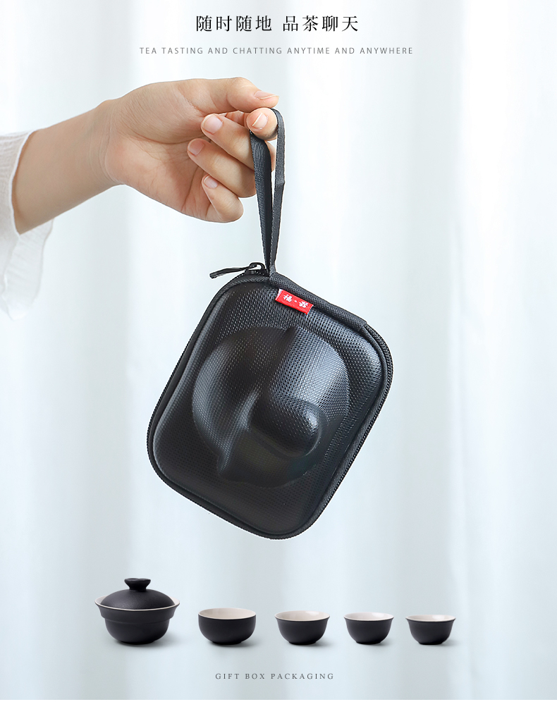 Black pottery mud seal portable travel tea set a pot of four cups of tureen crack cup teapot with Japanese custom logo