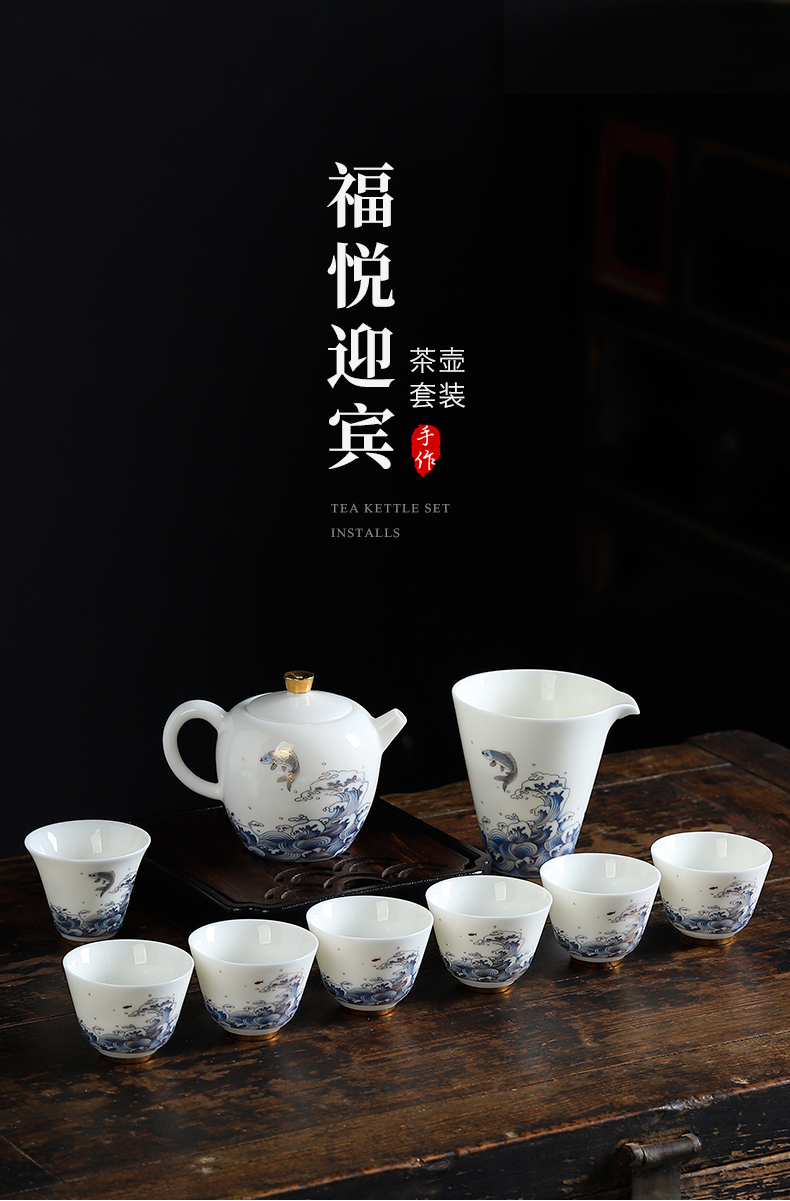 Mud printed white porcelain tea set suit small household kung fu tea cups dehua white porcelain teapot. A complete set of gift box office