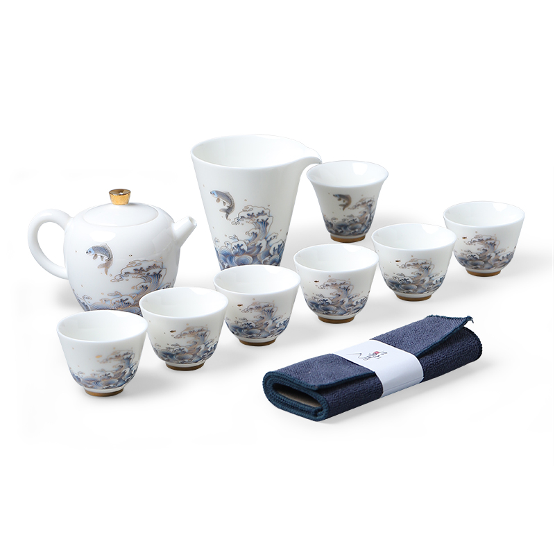 Mud printed white porcelain tea set suit small household kung fu tea cups dehua white porcelain teapot. A complete set of gift box office