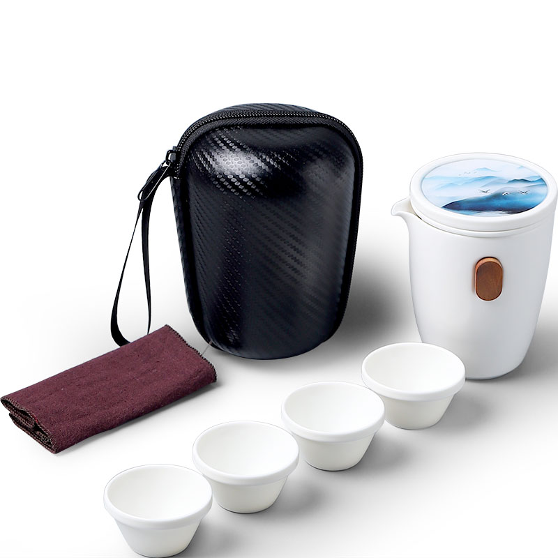 Mud seal travel tea set suit portable bag in a pot of four cups of ceramic teapot is suing tourism Japanese custom