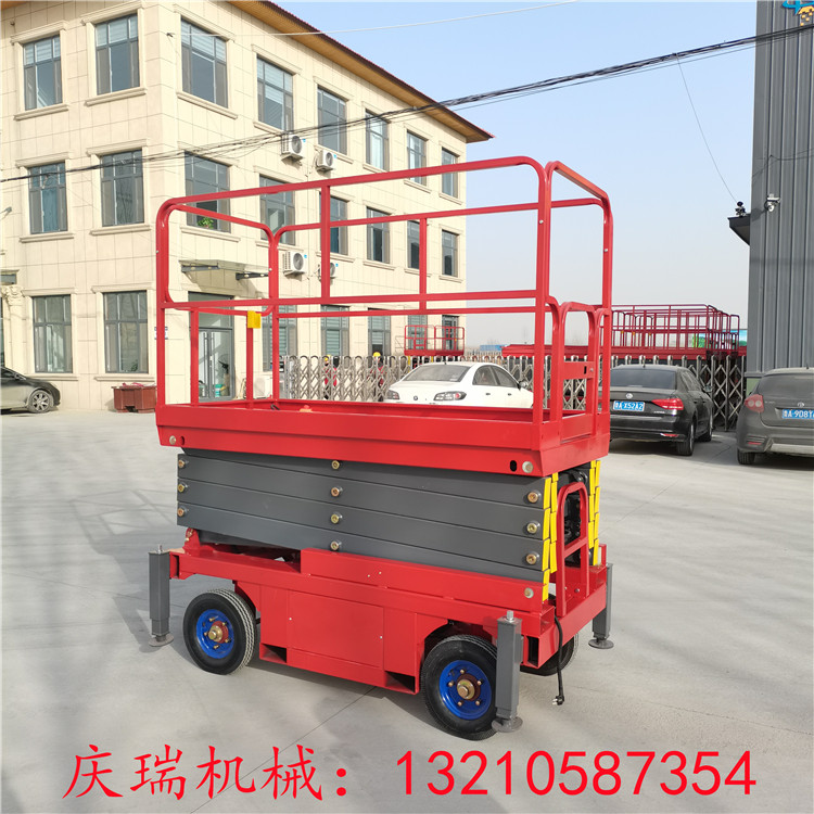 Construction site with four-wheeled mobile lift electric hydraulic lifting platform 6 8 10 12 m aerial vehicles