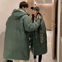 Зеленый пуховик