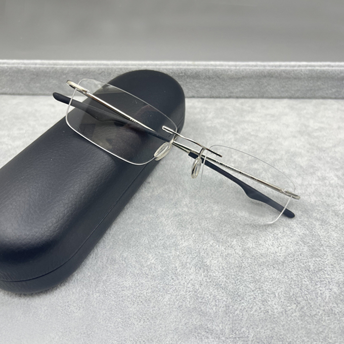 Ultra-Light and Comfortable Frameless Men's and Women's Myopia Glasses Frame Made of Pure Titanium for Business and Leisure Ox3122 Can Be Equipped with Prescription Glasses