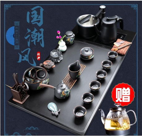 The new whole piece of natural black gold stone tea tray set Kung Fu tea household simple living room tea table automatic
