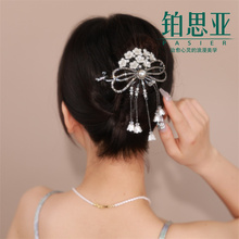 Platinum Asia antique style Suzuki tassel line clip, new curly hair clip, women's twisted clip, elegant temperament headwear hair accessories