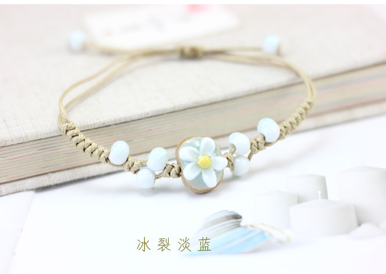 Vòng tay gió dân tộc Nữ Hàn Quốc Tính cách đơn giản Vòng tay hoa gốm đơn giản Joker Handmade Handmade Vòng tay hoa vòng tay nữ vàng 18k