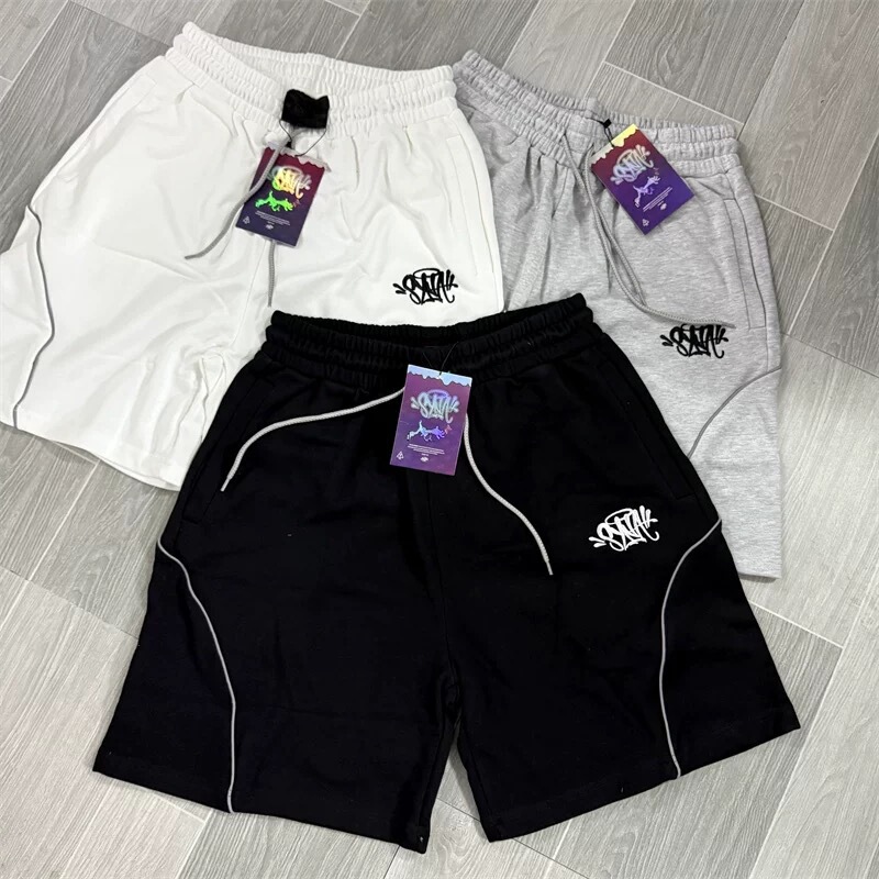 Syna World American Street Style Small Logo Embroidered Casual Pants with Reflective Strip Design Summer Unisex Drawstring Shorts Trendy Syna World American Street Style Small Logo Embroidered Casual Pants with Reflective Strip Design Summer Unisex Drawstring Shorts Trendy