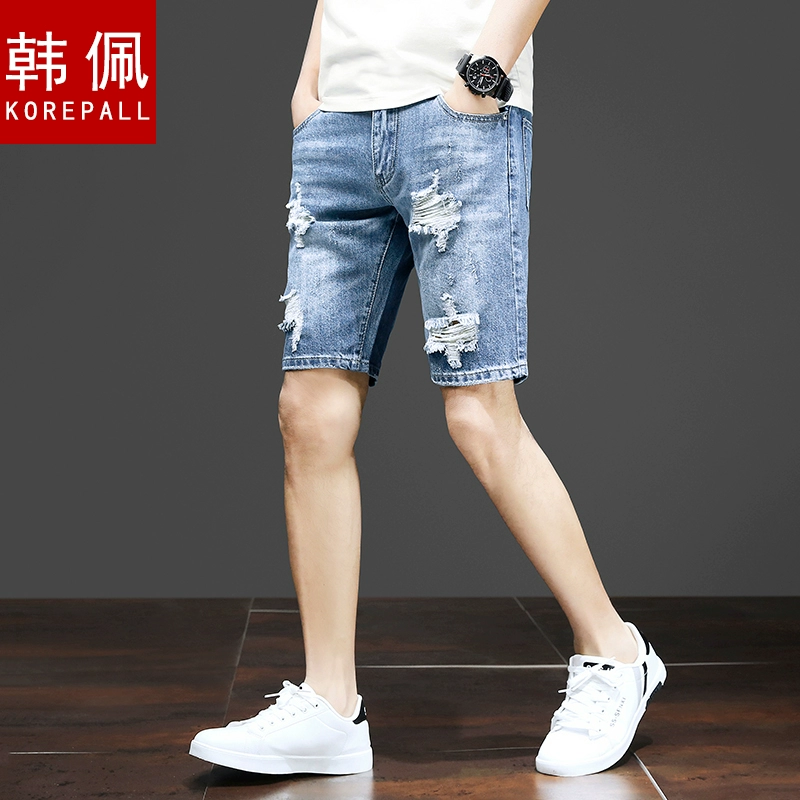 Han Pei hè xé quần jeans 5 điểm nam phong cách Hàn Quốc quần lọt khe 5 điểm hợp thời trang quần nam - Quần jean