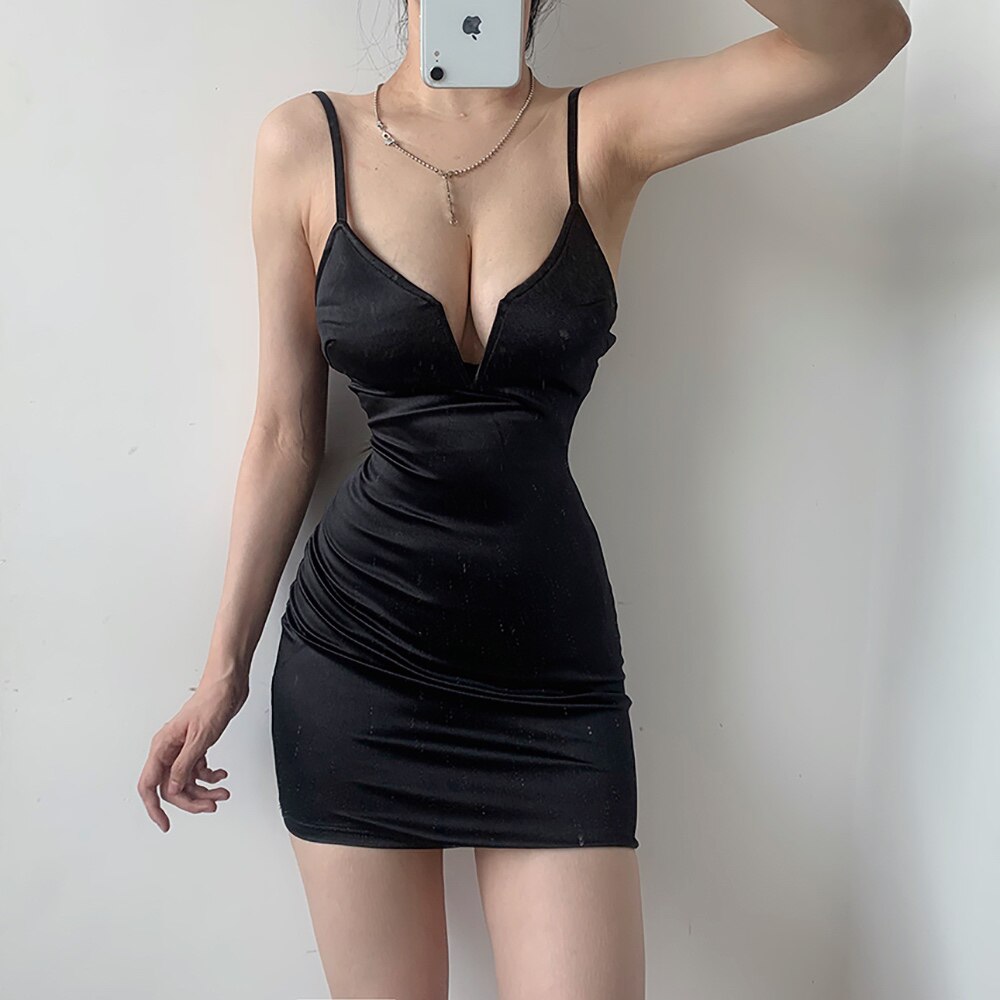 ZZ bone ZZ ZZ European and American sexy nightclub deep v-neck solid color bottoming sling big backless hip dress suspender skirt