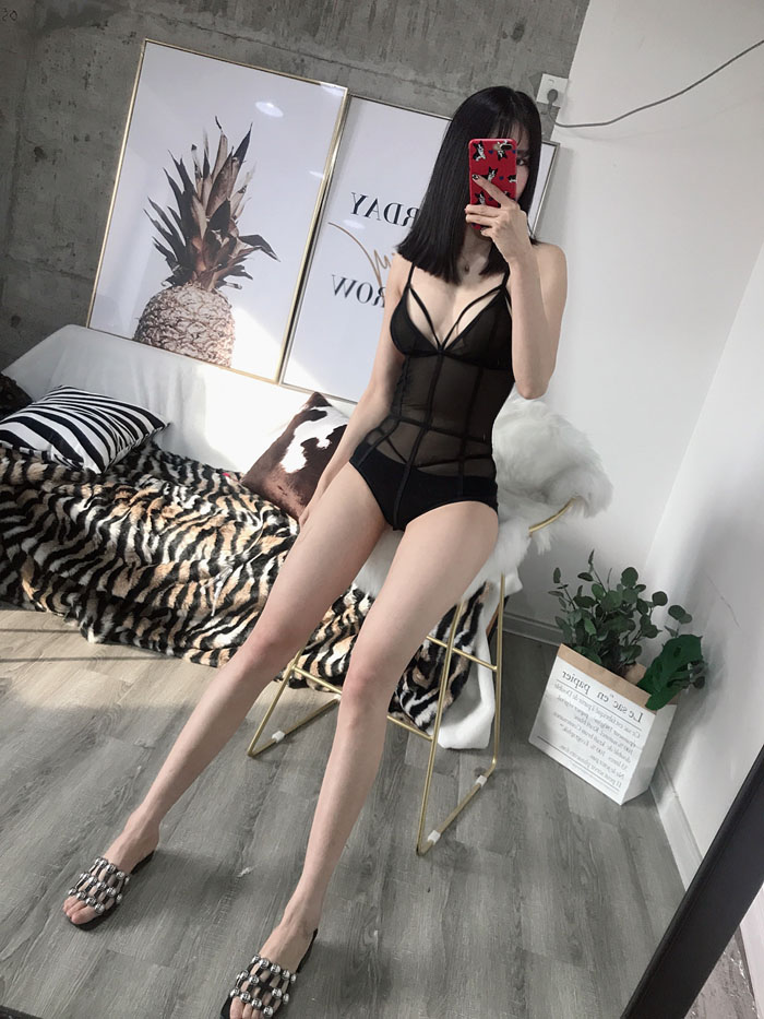 ZZ xương ZZ Châu Âu và phong cách Mỹ câu lạc bộ đêm hollow đấu thầu mô hình quan điểm hot girl sexy một mảnh slim eo sling jumpsuit