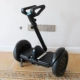 Xiaomi 9th cân bằng thanh xe kéo tay Điều khiển chân điều khiển chân 2 trong 1 - Smart Scooter