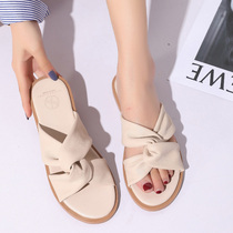 Net red cool drag female summer outside wear 2021 New Korean version of flat outdoor one word slippers seaside holiday open toe sandals