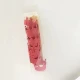 Коробка из 10 маленьких красных крон.