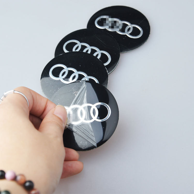 Suitable for Audi A4L A6L A6L A5 A5 Q3 Q5 Q7 Q7 car hub cover car label central cover change decoration sticker