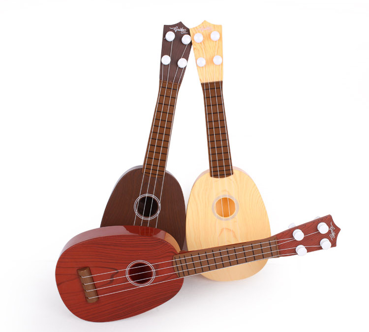 Trẻ em của đồ chơi đàn guitar có thể chơi mô phỏng mini ukulele cụ đàn piano đàn ông và phụ nữ bé âm nhạc guitar nhỏ nó