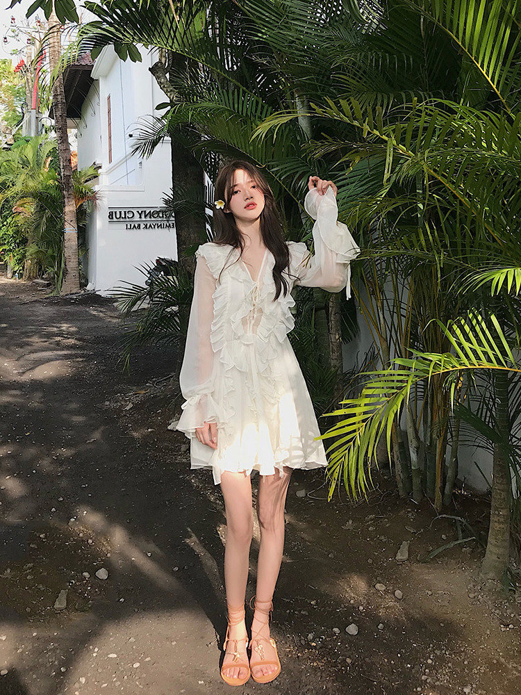 Early Spring 2023 seaside holiday wooden dress female Hainan Sanya tourist dress super fairy beach dress
