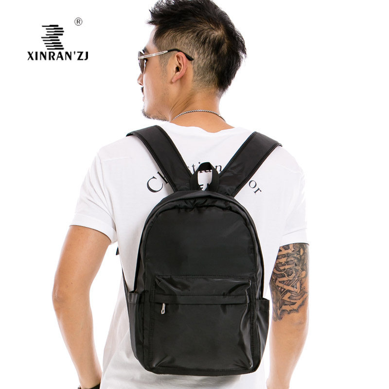 XINRAN ' ZJ light waterproof men's double shoulder bag leisure travel carry-on bag small and medium pure color male bag