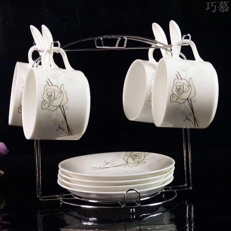 Qiao mu European ceramic coffee cup sets of high - grade up phnom penh creative four - piece spoon with ipads China coffee cups and saucers