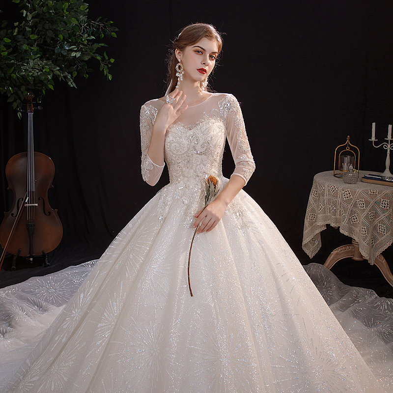 Long-sleeved main wedding dress 2020 new temperament bride small French style starry sky high-end luxury big trailing light
