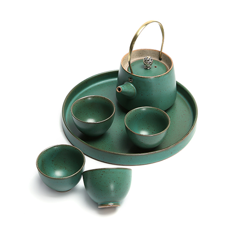 A complete set of Japanese kung fu tea set coarse pottery girder ceramic teapot tea with tea tray was contracted creative gift set