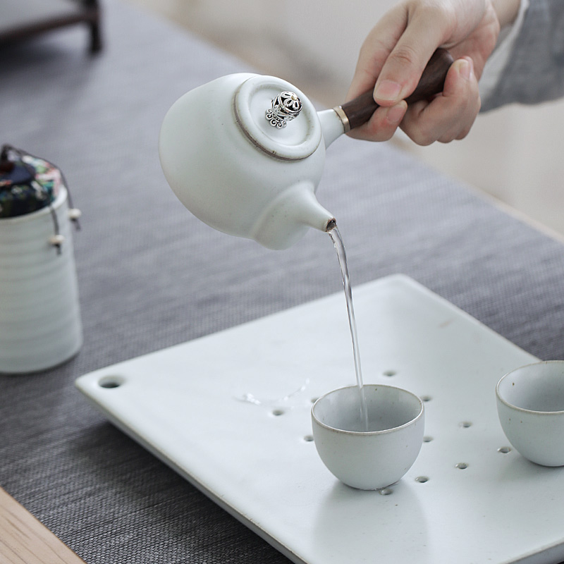 TaoZi Japanese black pottery archaize manual variable Taiwan old rock, ceramic teapot kung fu tea tea