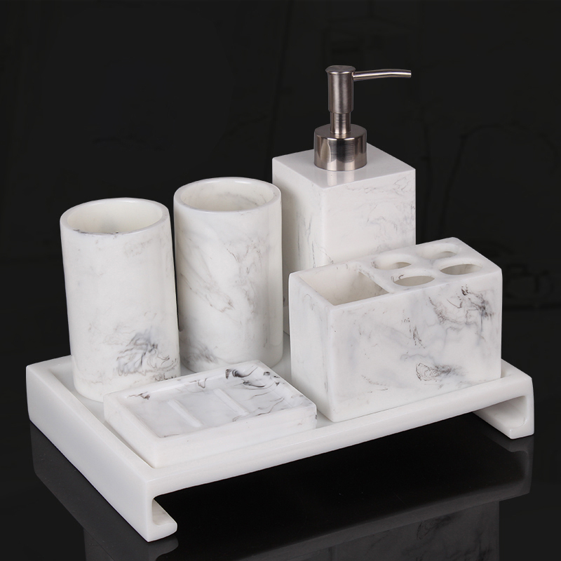 A minimal bathroom suite Bathroom suite Bathroom suite with resin mouthwash cup toothbrush frame suit