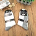 Vớ cotton bán buôn cotton nam vớ nhà máy trực tiếp 7 ngày khử mùi thấm mồ hôi ống thông thường kinh doanh vớ nam tất trắng cao cổ Vớ bông