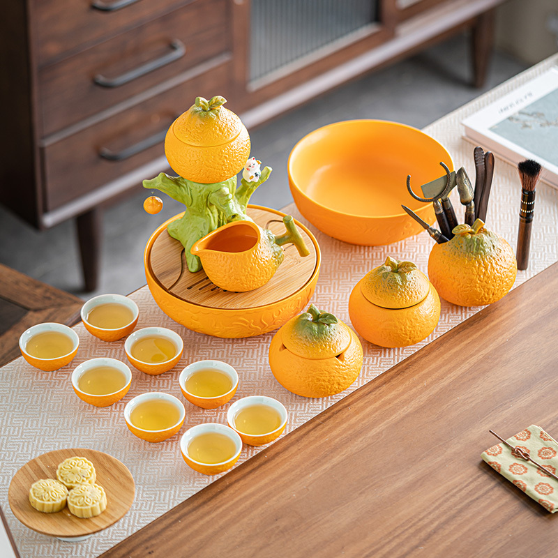 Automatic Kung Fu Tea Set for Lazy People, Creative Home Office Living Room Ceramic Tea Cup and Pot, Orange Tea Infuser