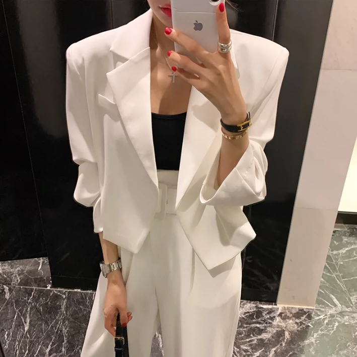 Hàn Quốc Dongdaemun Women 2020 hè thời trang mới khí chất trắng đi lại ngắn blazer se - Business Suit