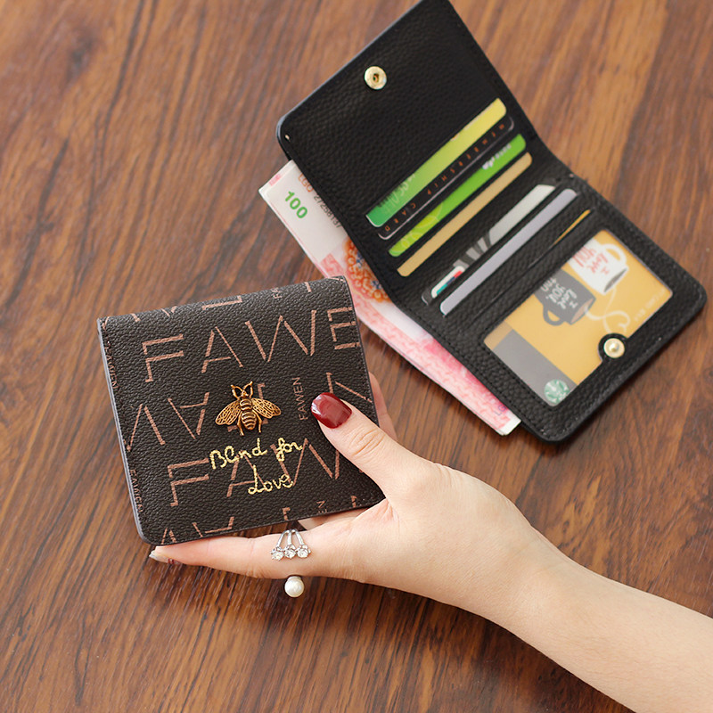 2022 new leather short clip printed big brand two fold cowhide ladies buckle wallet ultra-thin soft leather card bag